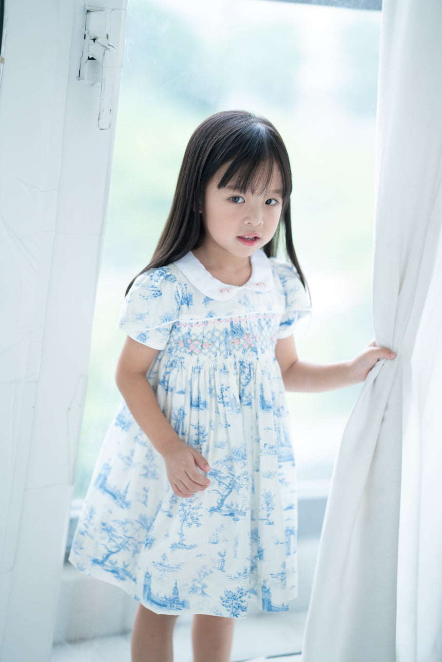 Charlotte in blue print